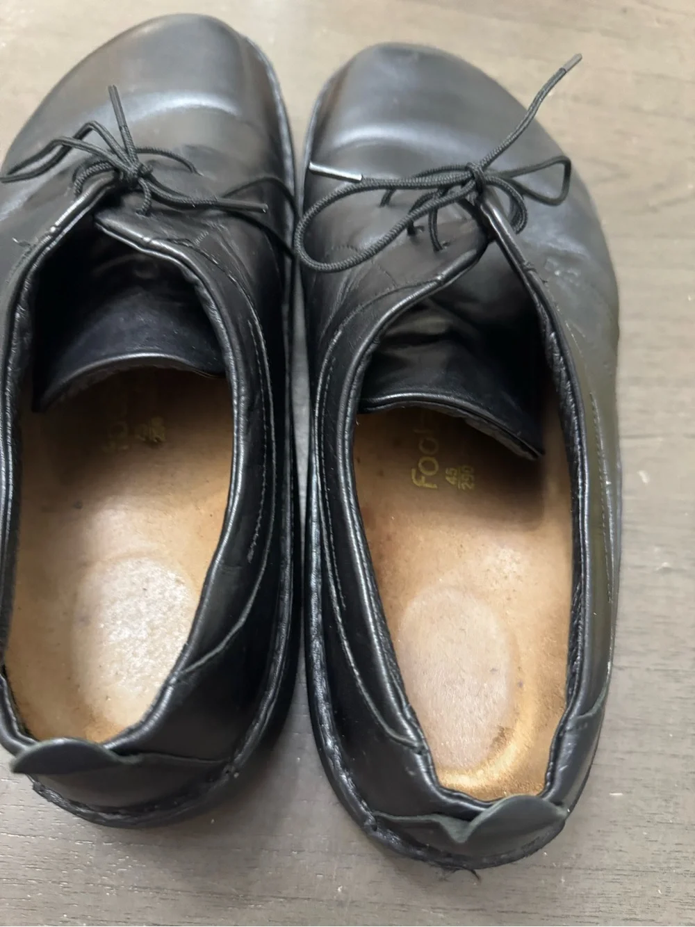 Footprints by Birkenstock mens black leather slip on shoes size EU 45. US 12.
